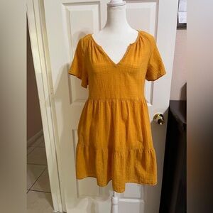(2) Mustard yellow mini dress with tiered ruffle hem V neckline